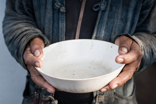 A beggar Begging bowl