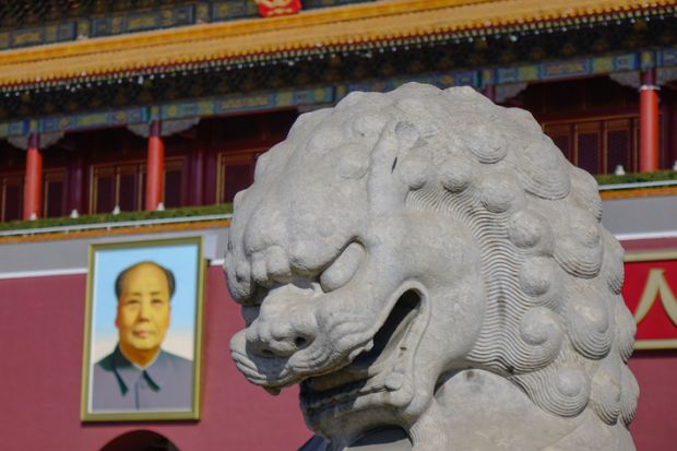 Beijing, China - Mar 1, 2018. A lion station at Gugong (Imperial Palace Museum, Gate of Chastity, Tiananmen) of Beijing, China.