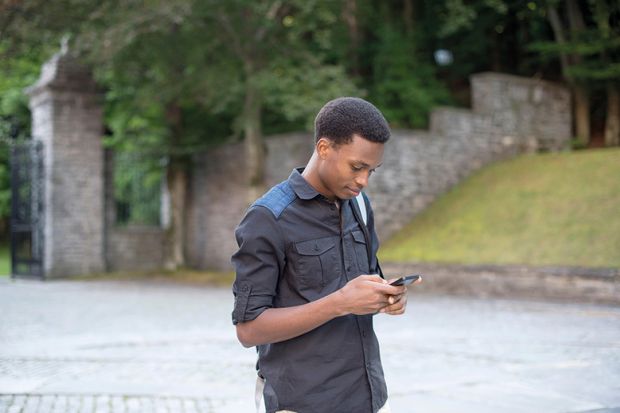 BME sutdent on mobile phone BME sutdent on mobile phone