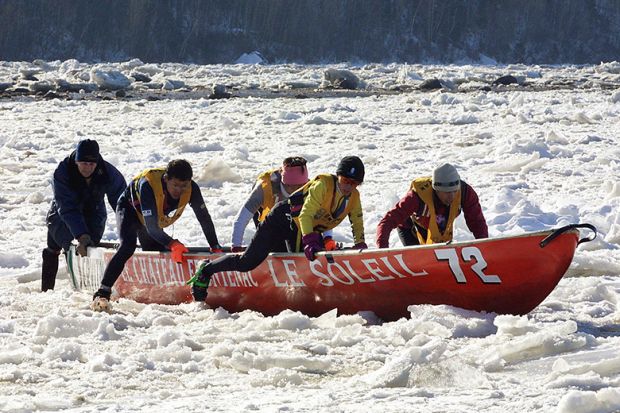 A team from Japan take part in a canoe race on ice, Quebec, illustrating that new international student caps hurt Quebec universities. A team from Japan take part in a canoe race on ice, Quebec, illustrating that new international student caps hurt Quebec universities.