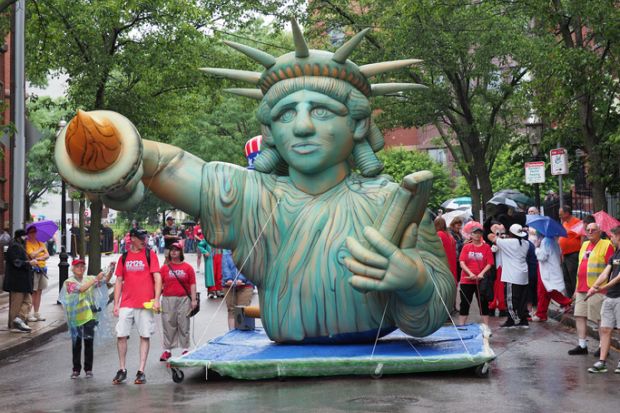 Boston, USA - June 16, 2019 Image of a Statue of Liberty float taken during the Bunker Hill Day Parade in Boston.