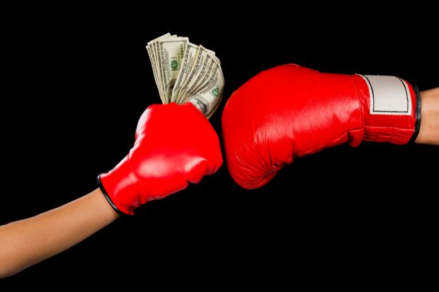 Boxing gloves and money