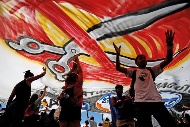 Professors and students protest against cuts to federal spending on higher education planned by Brazil’s President Jair Bolsonaro’s right-wing government in Brasilia in May 2019 Professors and students protest against cuts to federal spending on higher education planned by Brazil’s President Jair Bolsonaro’s right-wing government in Brasilia in May 2019