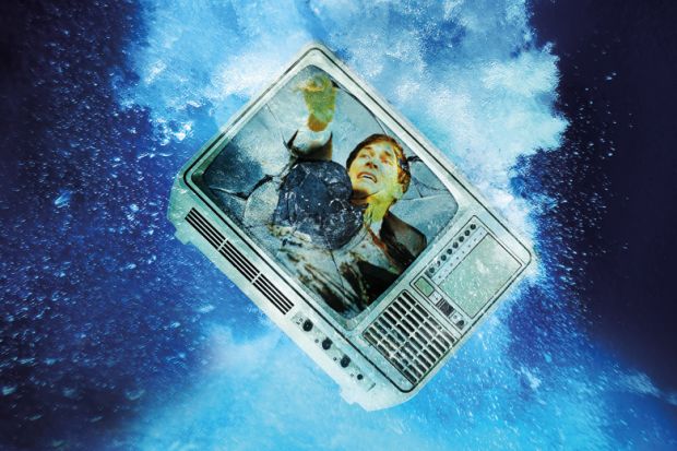 Broken television sinking underwater Broken television sinking underwater