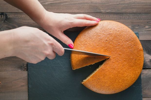 Cake being cut equally