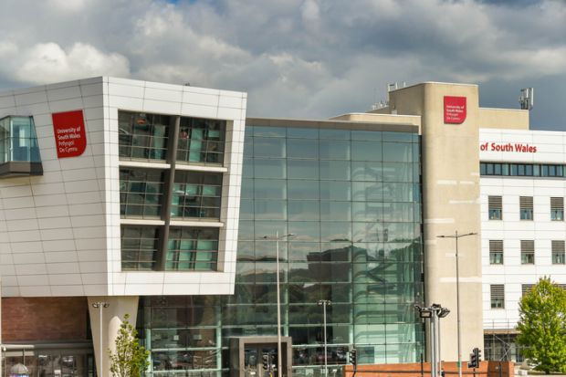 Cardiff, Wales - June 2019 Sign on the outside of the media department of the University of South Wales campus building in Cardiff city centre