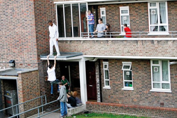 Children playing on UK council housing development Children playing on UK council housing development