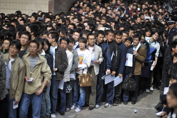 Crowd of graduates waiting for job fair, China Crowd of graduates waiting for job fair, China