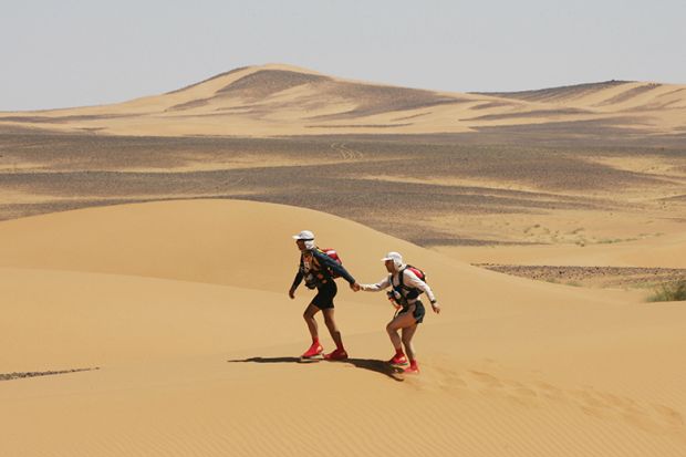 two people in desert Two people in desert