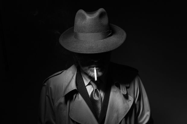 A film noir detective with face in shadow A film noir detective with face in shadow, symbolising the necessity of subterfuge