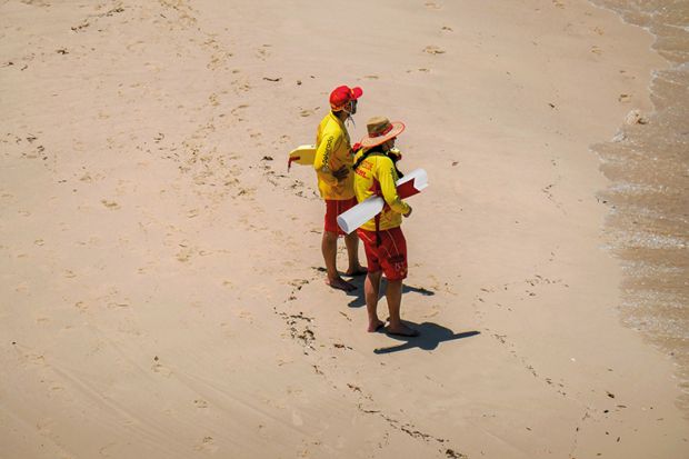 Two lifeguards on Australian beach Two lifeguards on Australian beach