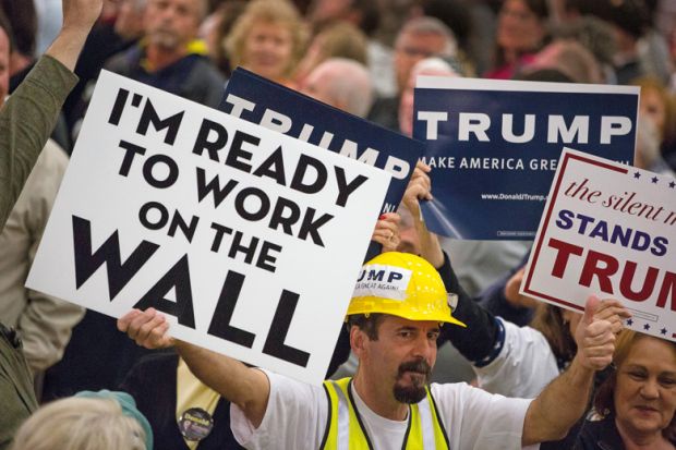 Donald Trump supporters holding placards Donald Trump supporters holding placards