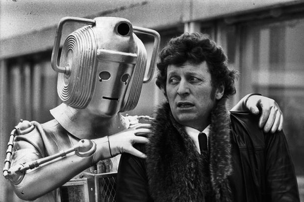 Dr Who (Tom Baker) looks concerned as a cyberman grabs his shoulders. To illustrate that most academics strongly opposed to using AI in REF 2029.