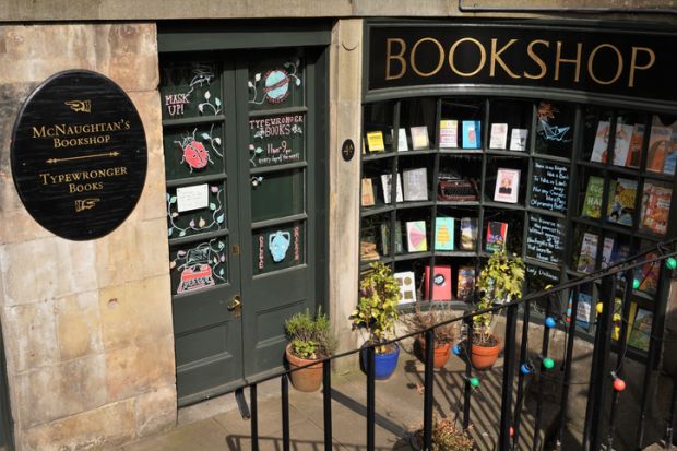 Edinburgh, Scotland - 8 April 2022 A small bookshop, claimed to be Edinburgh's smallest, at basement level near the top of Leith Walk. This shop is well-known for servicing and repairing old, manual, typewriters