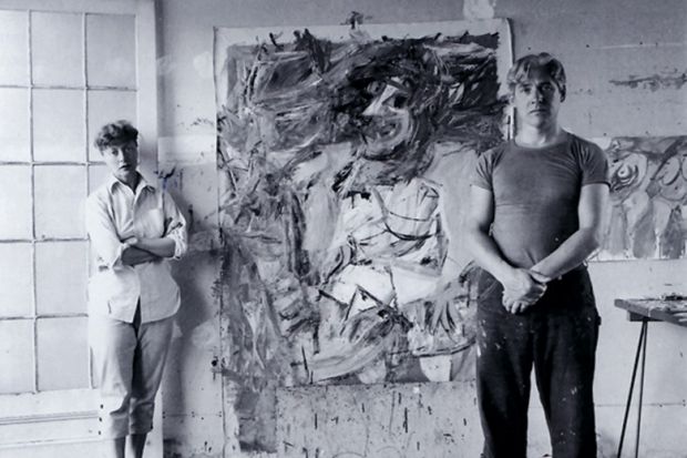Elaine and Willem de Kooning standing in front of painting Elaine and Willem de Kooning standing in front of painting