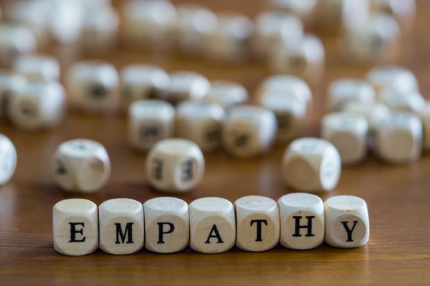 Dice spell out the word "empathy" Dice spell out the word "empathy"