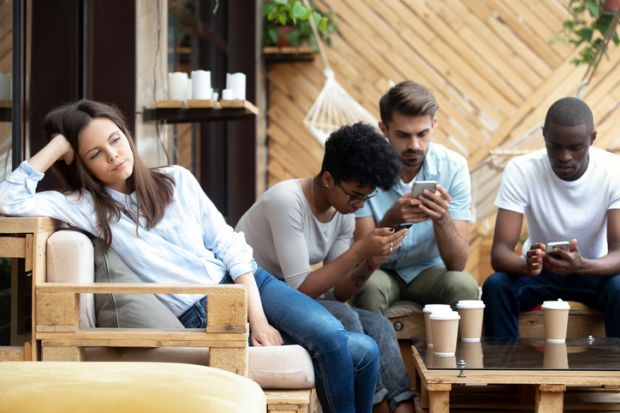 A female student excluded froma group of male students