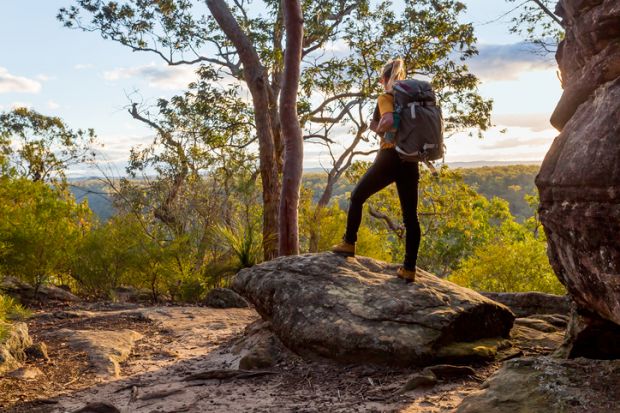 Female hiker bushwalking in Australian bushland