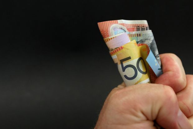 fist full of Australian notes