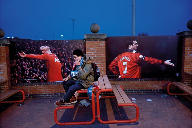 football fan sitting alone