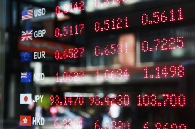 Electronic currency exchange notice board with several currencies listed