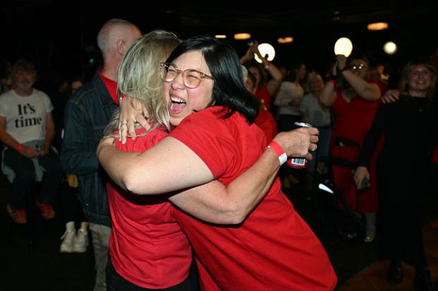 Labor Party supporters react as national broadcaster ABC projected a win for the party Labor Party supporters react as national broadcaster ABC projected a win for the party