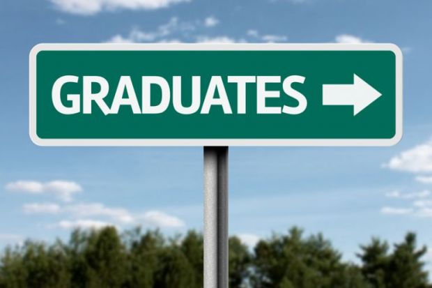 Graduates sign Graduates sign