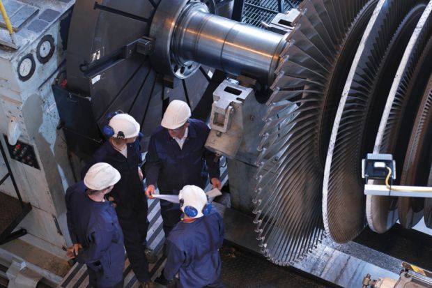 Group of engineers in discussion Group of engineers in discussion