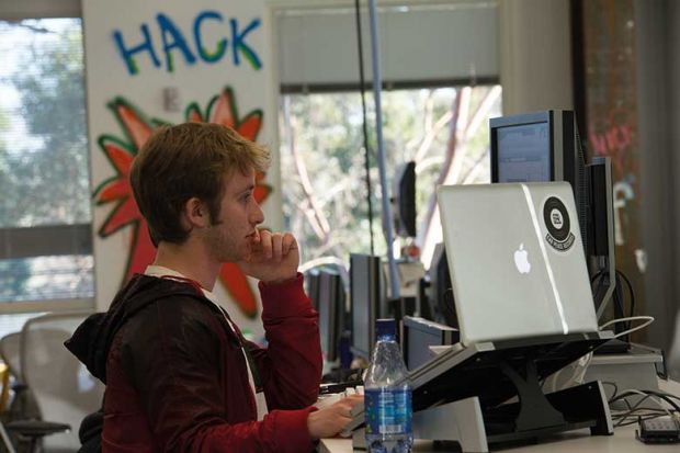 hacker-using-two-screens hacker-using-two-screens
