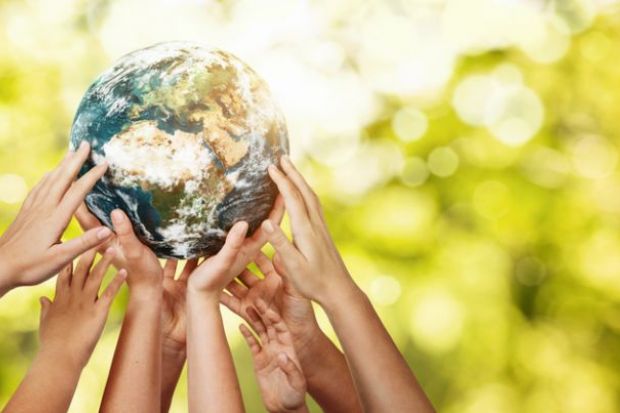 Hands holding up Planet Earth Hands holding up Planet Earth, commitment to United Nations SDGs, THE Impact Rankings 2021 blog