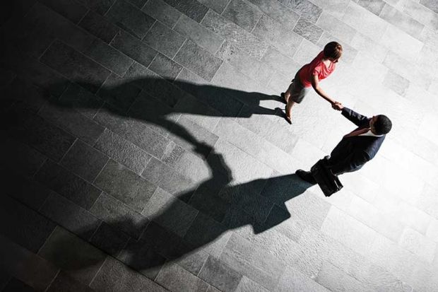 handshake_shadow_getty handshake_shadow_getty