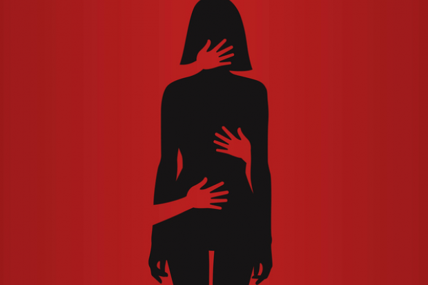 Silhouette of a woman with hands on her, illustrating sexual harassment