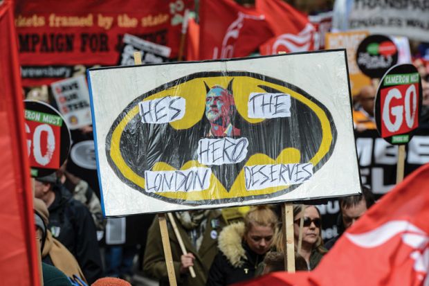 Health, Homes, Jobs and Education demonstrators hold Jeremy Corbyn placard, London Health, Homes, Jobs and Education demonstrators hold Jeremy Corbyn placard, London