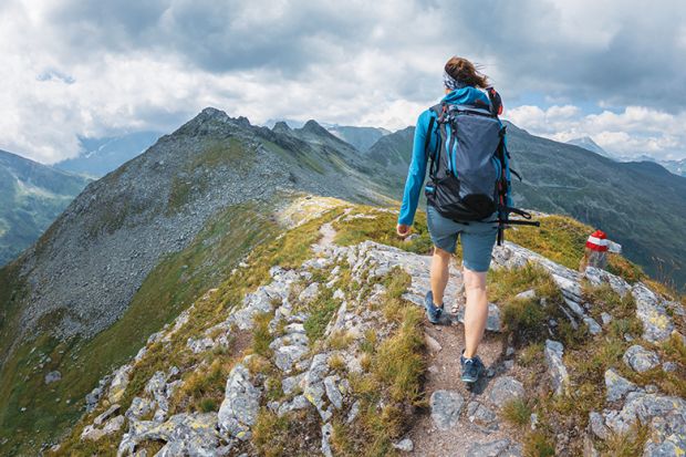 woman hiking to illustrate taking time out woman hiking to illustrate taking time out