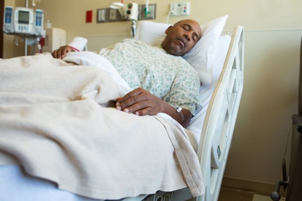 Man in hospital bed