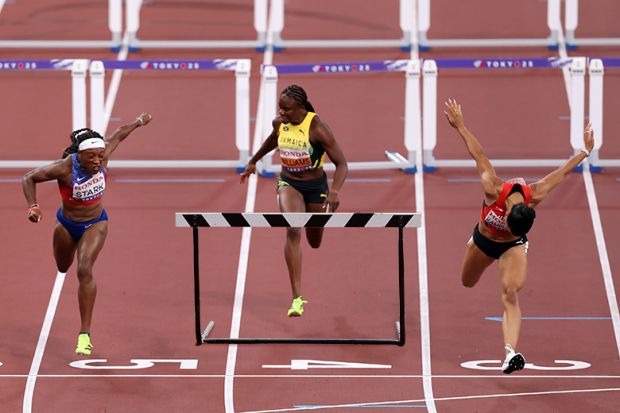 Runners at the finish line for the Women's 100 Metres Hurdles, with an added hurdle for the runner coming in 3rd. To illustrate that the revamped TEF could punish providers with lower ratings by limiting the number of additional students they can recruit.