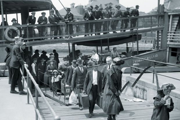 Immigrants disembarking boat, Ellis Island, New York City Immigrants disembarking boat, Ellis Island, New York City