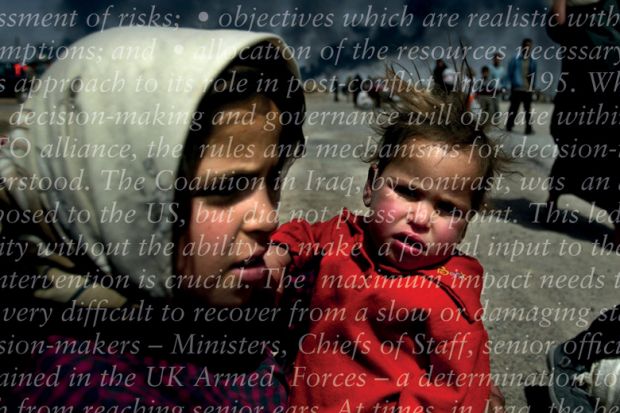 Iraqi woman holding small child Iraqi woman holding small child