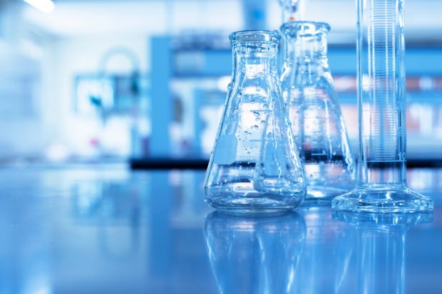 Glass flask and cylinder in lab