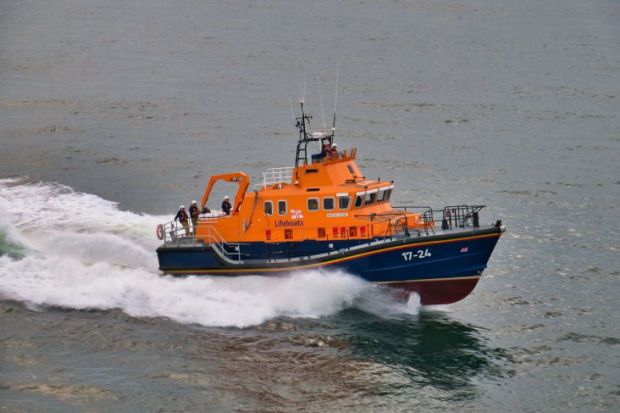 RNLI Lifeboat at sea, travelling at speed
