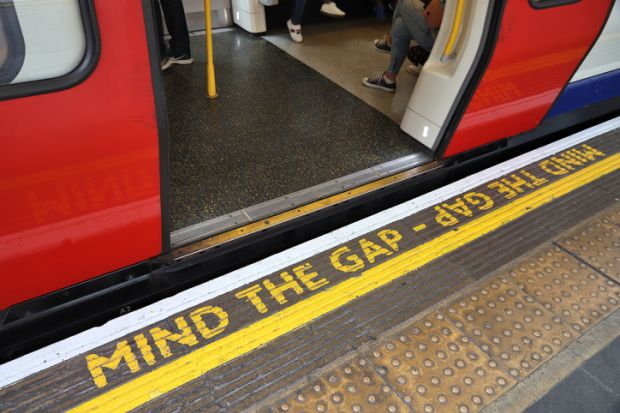 Mind The Gap warning at London Underground station.