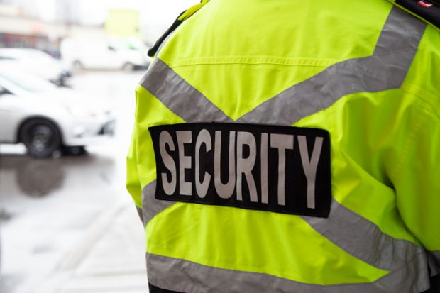 Security guard watching over parking area