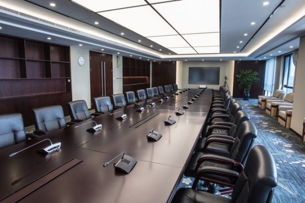 Boardroom with chairs and intercom system Boardroom with chairs and intercom system