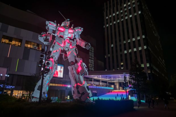 Gundam, real size model, light up at Divercity Tokyo plaza at night in Oodaiba area. Gundam, real size model, light up at Divercity Tokyo plaza at night in Oodaiba area.