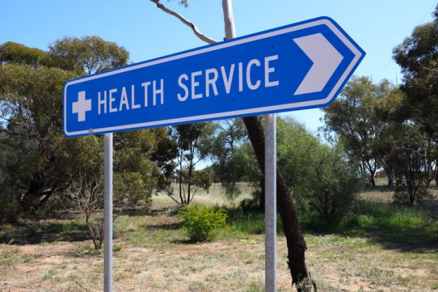 Directional road sign, to health services, small rural Outback town in Western Australia