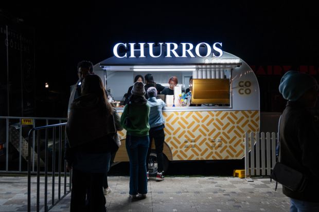 People queuing for churros at the night market in Sydney, Australia 