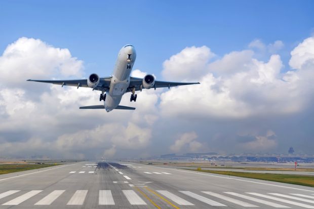 Airplane ascends into the sky after leaving the runway Airplane ascends into the sky after leaving the runway