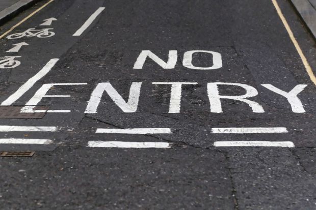 ‘No entry’ painted on a road access, widening participation, no entry