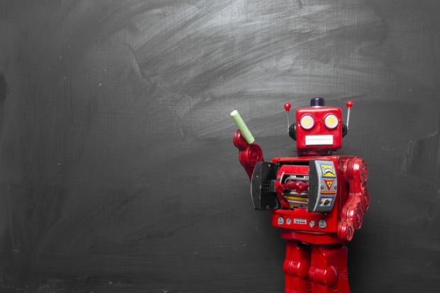 Robot by blackboard holding chalk Robot by blackboard holding chalk