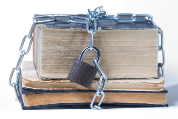 'Copyright' padlock around book